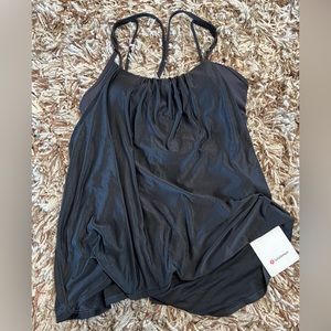 New black Lululemon flow y 2-in-1 tank. Size 8. Built in bra.